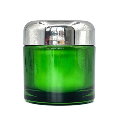 L'emballage cosmétique écologique vert 50g 100g a métallisé des pots pour des produits de soin pour la peau