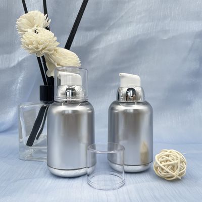 Les bouteilles privées d'air de pompe de la torsion 80ml 100ml nettoient à l'aspirateur la milliseconde Metallized Round Bottom de pp