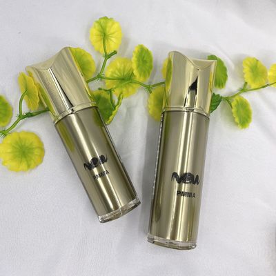 Conteneurs cosmétiques rechargeables 80ml 100ml de forme de pompe d'or cosmétique spécial de bouteille