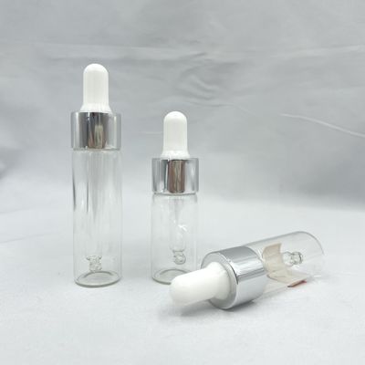 le cosmétique en verre de 10ml 15ml met la forme en bouteille droite avec le compte-gouttes en aluminium d'huile
