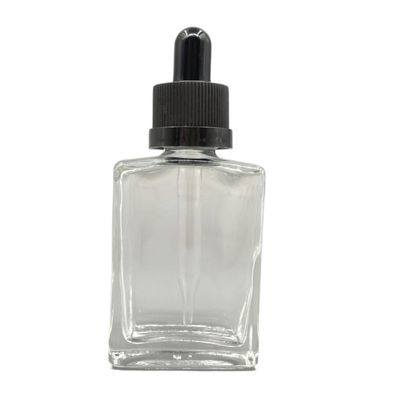 Le cosmétique en verre de la place 30ml met le chapeau en bouteille sans danger pour les enfants de compte-gouttes pour l'huile de soins capillaires